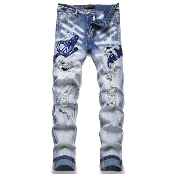 AMIRI Blue Distressed Skinny Jeans with Patchwork - Picture 1 of 9